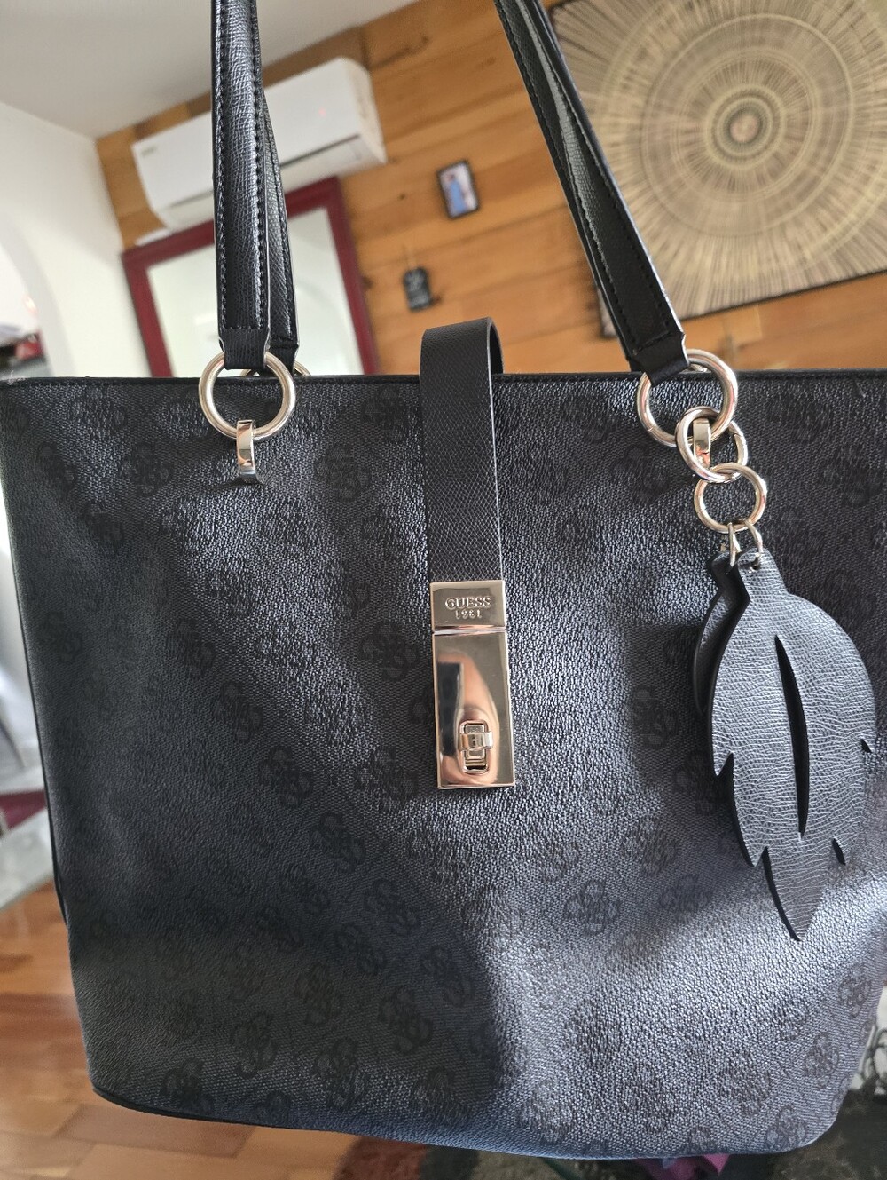 GUESS Black Tote with Gold-Tone Hardware and Charm
